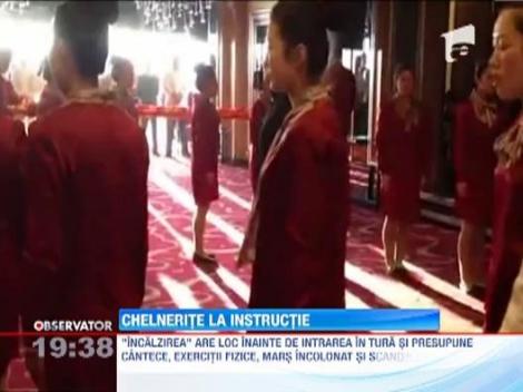 Observator Special: Chelneritele din China fac armata, inainte de a servi clientii!