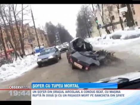 Rusia: A fugit de la locul accidentului cu masina rupta in doua si cu un pasager mort pe bancheta din spate