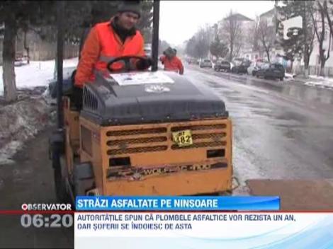 In Botosani, strazile sunt asfaltate pe ninsoare