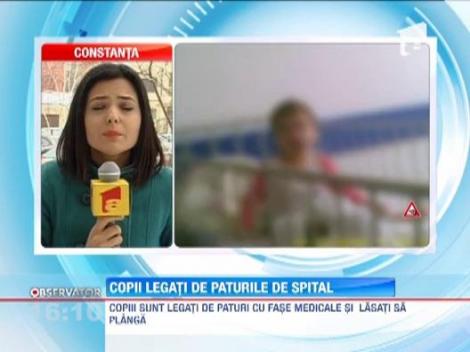 Imagini cutremuratoare la spitalul de pediatrie din Buzau! Copiii internati sunt tinuti legati de pat!