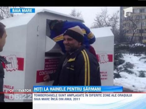 Doi baimareni, surprinsi in timp ce furau haine de la nevoiasi