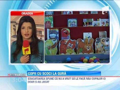 O educatoare din Timisoara le-a lipit copiilor gura cu scotch ca sa nu mai vorbeasca