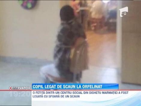 O fetita a fost legata de un scaun intr-un orfelinat din Sighetu Marmatiei