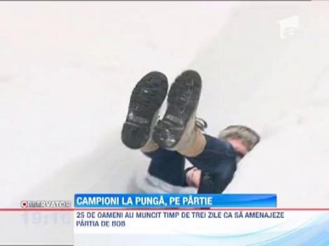 Concurs de coborare cu punga pe o partie de bob