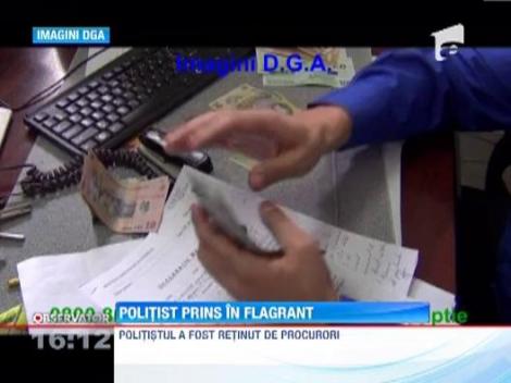 Constanta: Un politist cu o vechime de peste 20 de ani a fost prins in timp ce primea mita