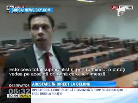 Un corespondent al televiziunii britanice SkyNews a fost arestat in timp ce transmitea in direct de la Beijing