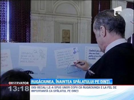Gigi Becali le-a spus unor copii ca rugaciunea e la fel de importanta ca spalatul pe dinti