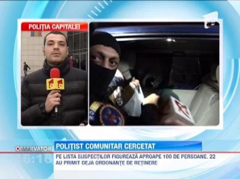 Politist comunitar cercetat in dosarul falsificatorilor de carduri