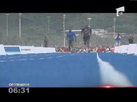 Usain Bolt face sport pe plaja