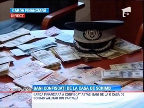 Un sac plin cu bani a fost confiscat astazi de Garda Financiara dintr-o casa de schimb valutar din Capitala