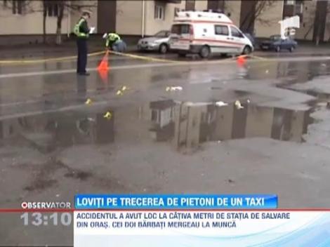 Doi barbati, loviti pe trecerea de pietoni de un taximetrist