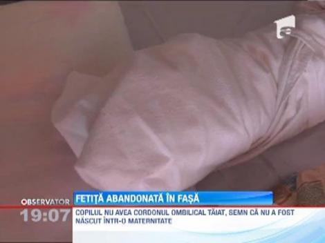 Bebelus abandonat pe un pres, in scara unui bloc din Capitala!