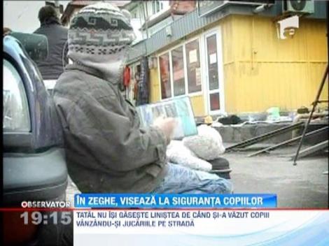 Tatal copiilor din Cluj obligati sa isi vanda jucariile pe strada cere sa isi vada fetita si baiatul