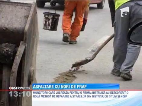 Strazile din Bistrita se asfalteaza cu nisip si bitum topit