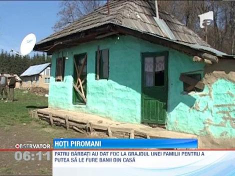 Patru barbati au dat foc la grajdul unei familii pentru a putea sa le fure banii din casa