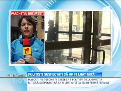 9 politisti de la Brigada Rutiera Bucuresti, retinuti de mascati