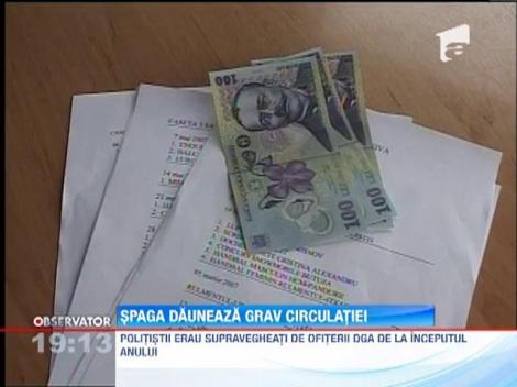 UPDATE / 9 politisti de la Brigada Rutiera Bucuresti, retinuti de mascati