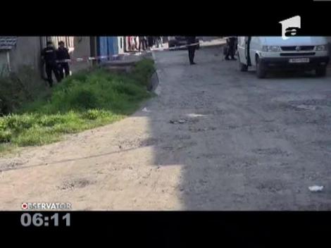 Reglare de conturi cu focuri de arma in strada intre doua familii