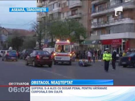 Motociclist lovit de o masina de teren