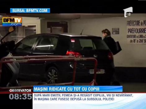 Doua masini parcate ilegal au fost ridicate cu tot cu copii, in Franta