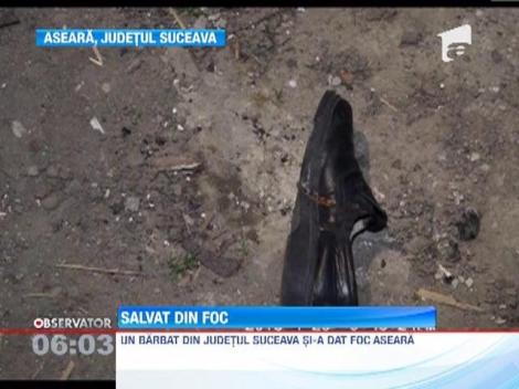 Un barbat din Suceava si-a dat foc in fata casei