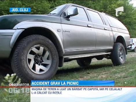 O masina de teren careia i-a cedat frana de mana a accidentat doi barbati aflati la picnic