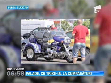 Cornel Palade merge la cumparaturi cu trike-ul