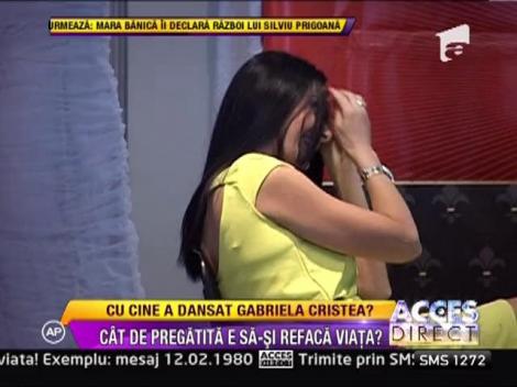 Gabriela Cristea, dans cu un barbat misterios