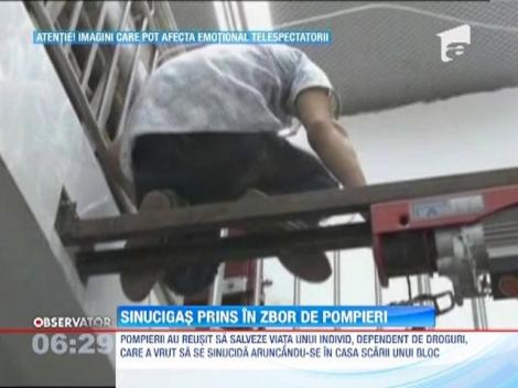 IMAGINI SOCANTE! / Sinucigas prins in zbor de pompieri
