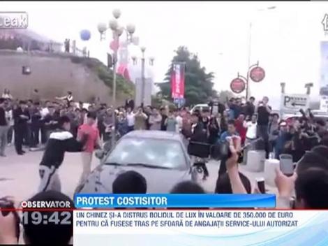 Un chinez si-a distrus masina, in valoare de 350.000 de euro, fiind nemultumit de cum a fost tratat la un service auto