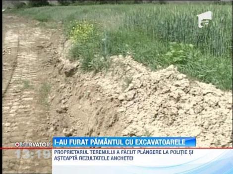 I-au furat pamantul fertil cu basculanta