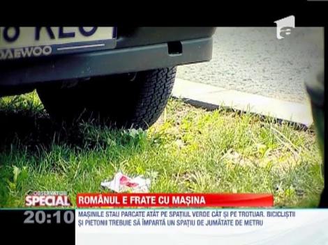 Romanul e frate cu masina. O parcheaza direct pe spatiul verde
