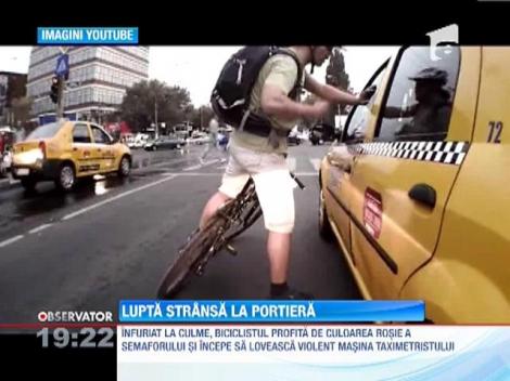 Scandal cu pumnii si picioarele intre un biciclist si un taximetrist