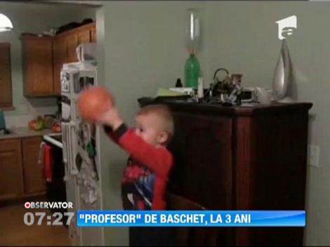 Un copil de trei ani arunca la cos cu o indemanare demna de un star