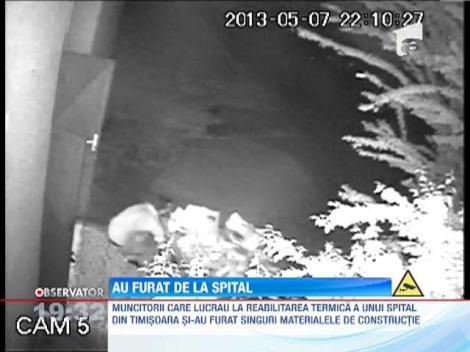 Muncitorii care lucrau la reabilitarea termica a spitalului din Timisoara, surprinsi cand furau materialele de constructii