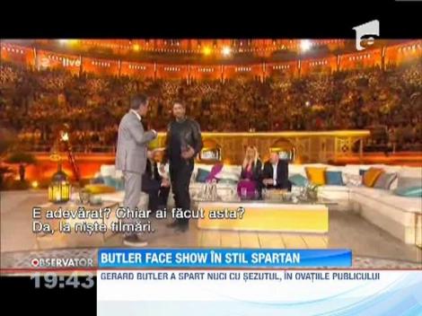 Gerard Butler, gheata in pantaloni si nuci sparte cu sezutul