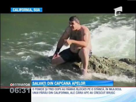 Un parau din California a izolat o familie pe o stanca