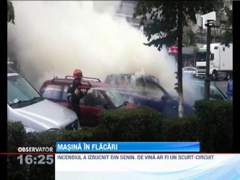 Masina in flacari, din cauza unui scurt circuit
