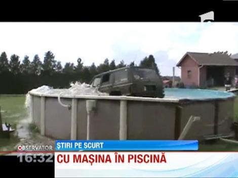 Un sofer din Canada a sarit cu masina in piscina