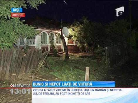 Update / Un batran si nepotul lui de numai trei ani au fost luati de o viitura, in Iasi