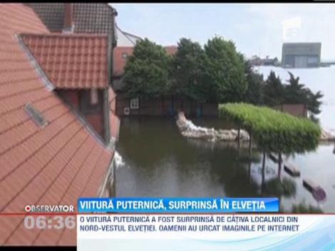 Imagini cutremuratoare cu viitura din Elvetia