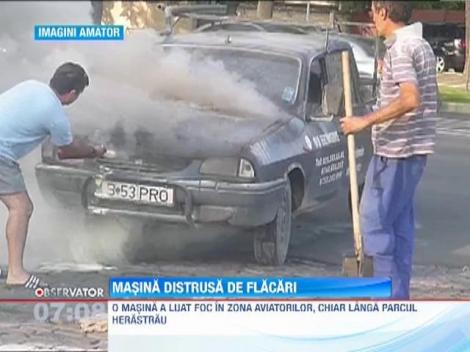 Masina distrusa de flacari, in Capitala