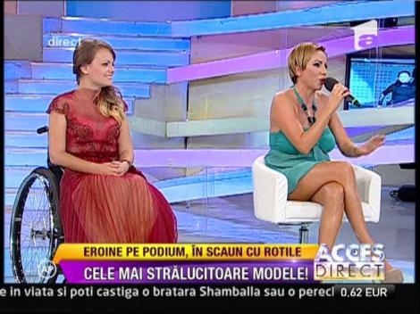 Pe podium, in scaun cu rotile