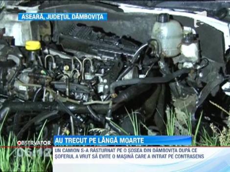 Patru oameni au fost la un pas sa fie striviti de un TIR, pe o sosea din Dambovita