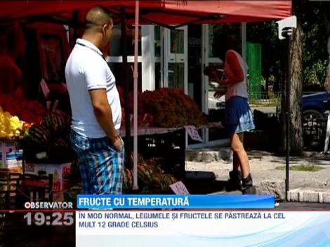 Comerciantii din piete tin marfa in soare