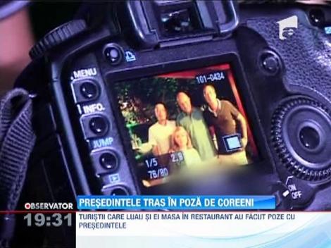 Presedintele Traian Basescu, tras in poza de coreeni