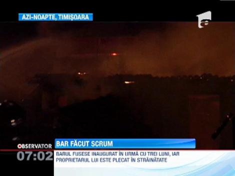 Bar mistuit de flacari, in Timisoara