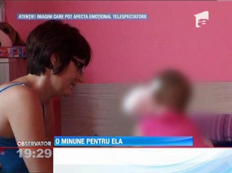 O copila operata de o tumoare faciala, anul trecut, se lupta pentru viata