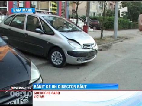 Directorul unui centru comunitar din Baia Mare s-a urcat baut la volan si a lovit trei masini dintr-o parcare