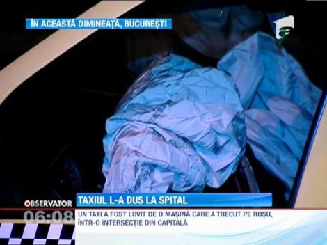 Un taxi a fost lovit de o masina care a trecut pe rosu, intr-o intersectie din Bucuresti